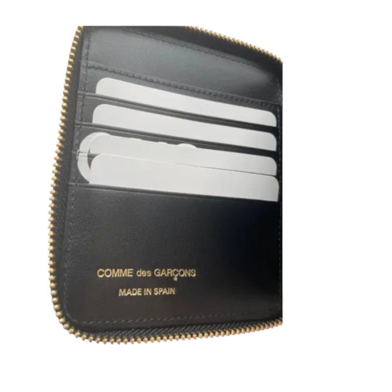 Comme Des Garçons Wallet logo-print zip-fastening wallet - Premium Wallets & Money Clips from Comme Des Garcons - Just $195! Shop now at Sunset Boutique